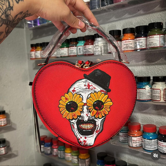 Red heart bag clown